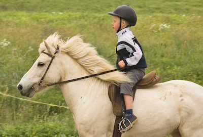 Boy Riding Horse